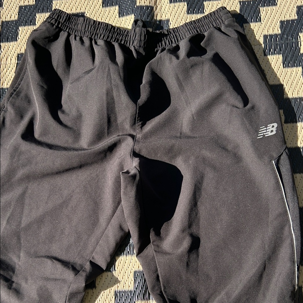 New Balance Men’s Black Athletic Pants with Ankle Zip Detail and Pockets